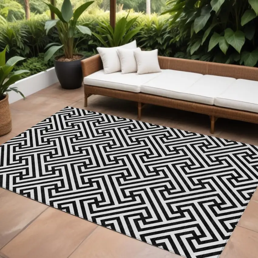Black And Ivory Geometric Washable Indoor Outdoor Area Rug Photo 1