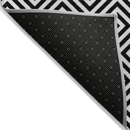 Black And Ivory Geometric Washable Indoor Outdoor Area Rug Photo 2