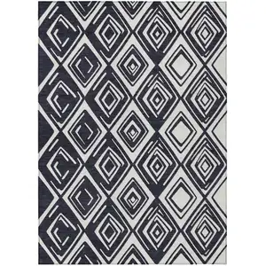 Photo of Black And Ivory Geometric Washable Indoor Outdoor Area Rug