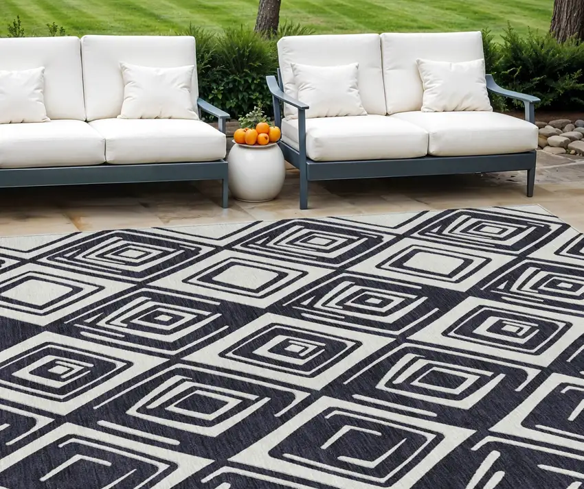 Black And Ivory Geometric Washable Indoor Outdoor Area Rug Photo 1