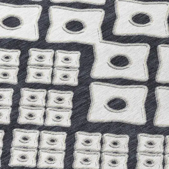 Black And Ivory Geometric Washable Indoor Outdoor Area Rug Photo 7