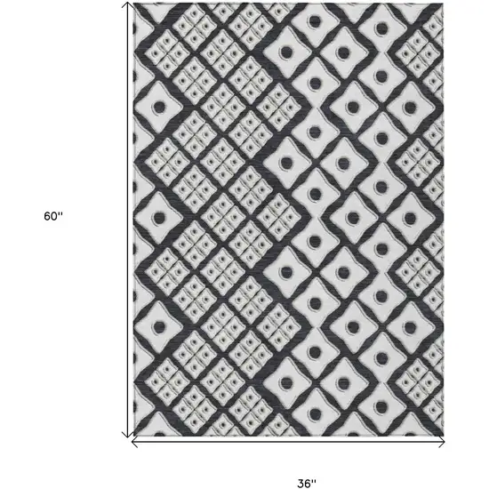 Black And Ivory Geometric Washable Indoor Outdoor Area Rug Photo 3