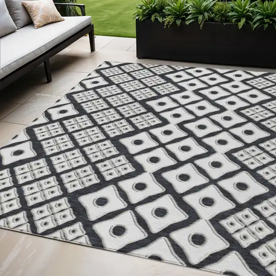 Black And Ivory Geometric Washable Indoor Outdoor Area Rug Photo 1