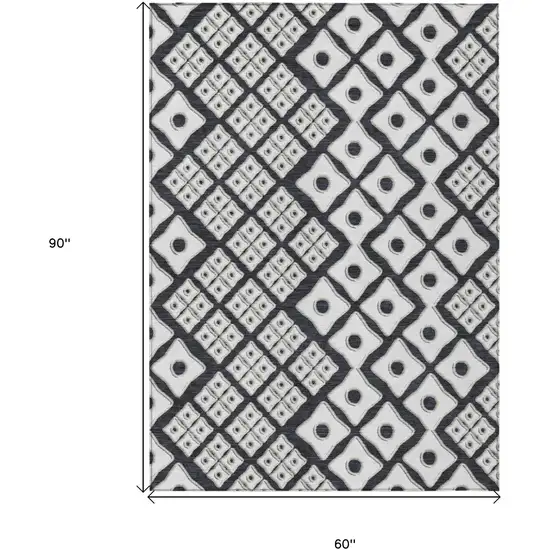 Black And Ivory Geometric Washable Indoor Outdoor Area Rug Photo 3