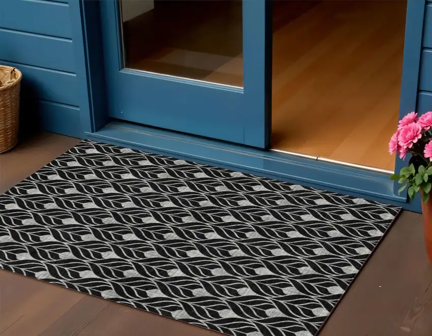 Black And Ivory Geometric Washable Indoor Outdoor Area Rug Photo 1