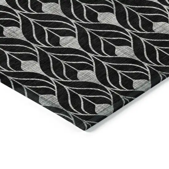 Black And Ivory Geometric Washable Indoor Outdoor Area Rug Photo 4