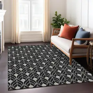 Photo of Black And Ivory Geometric Washable Indoor Outdoor Area Rug