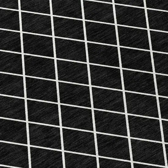 Black And Ivory Geometric Washable Indoor Outdoor Area Rug Photo 4
