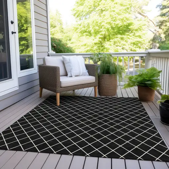 Black And Ivory Geometric Washable Indoor Outdoor Area Rug Photo 8