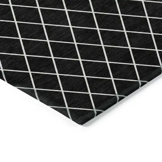 Black And Ivory Geometric Washable Indoor Outdoor Area Rug Photo 4