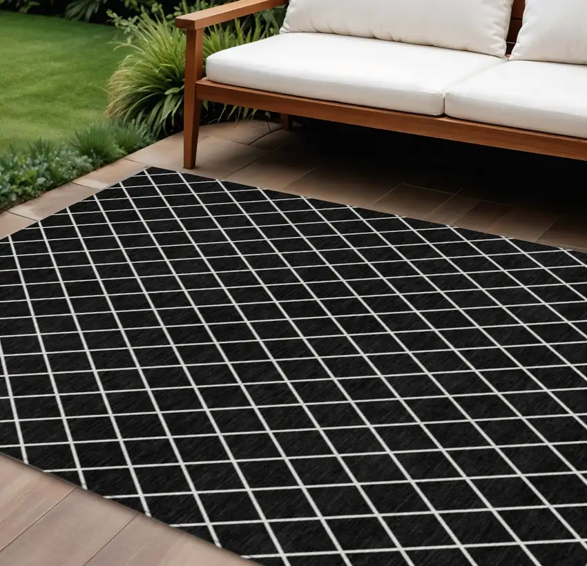 Black And Ivory Geometric Washable Indoor Outdoor Area Rug Photo 1