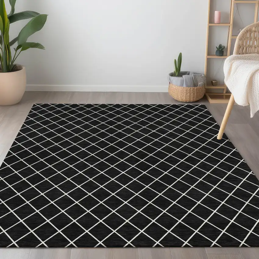 Black And Ivory Geometric Washable Indoor Outdoor Area Rug Photo 9
