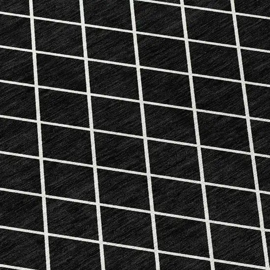 Black And Ivory Geometric Washable Indoor Outdoor Area Rug Photo 5