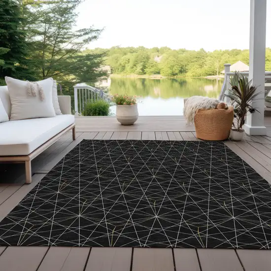 Black And Ivory Geometric Washable Indoor Outdoor Area Rug Photo 9