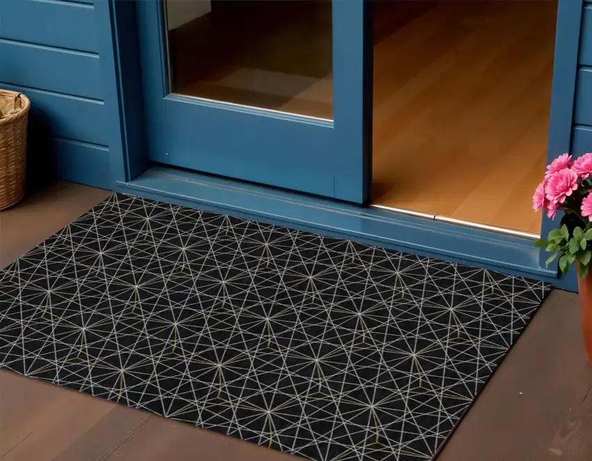 Black And Ivory Geometric Washable Indoor Outdoor Area Rug Photo 1