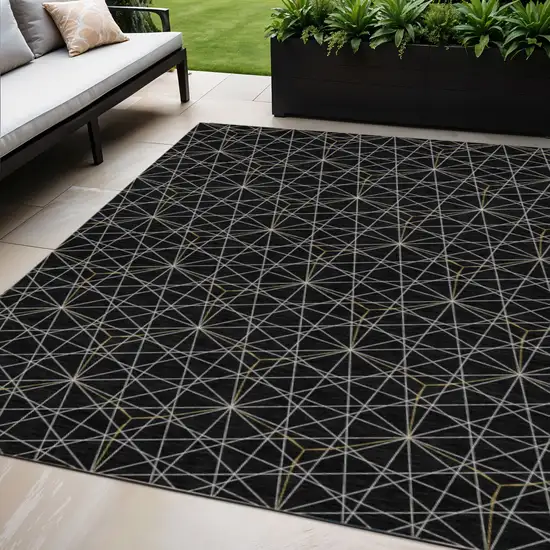 Black And Ivory Geometric Washable Indoor Outdoor Area Rug Photo 1