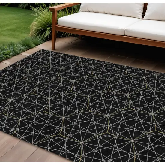 Black And Ivory Geometric Washable Indoor Outdoor Area Rug Photo 1