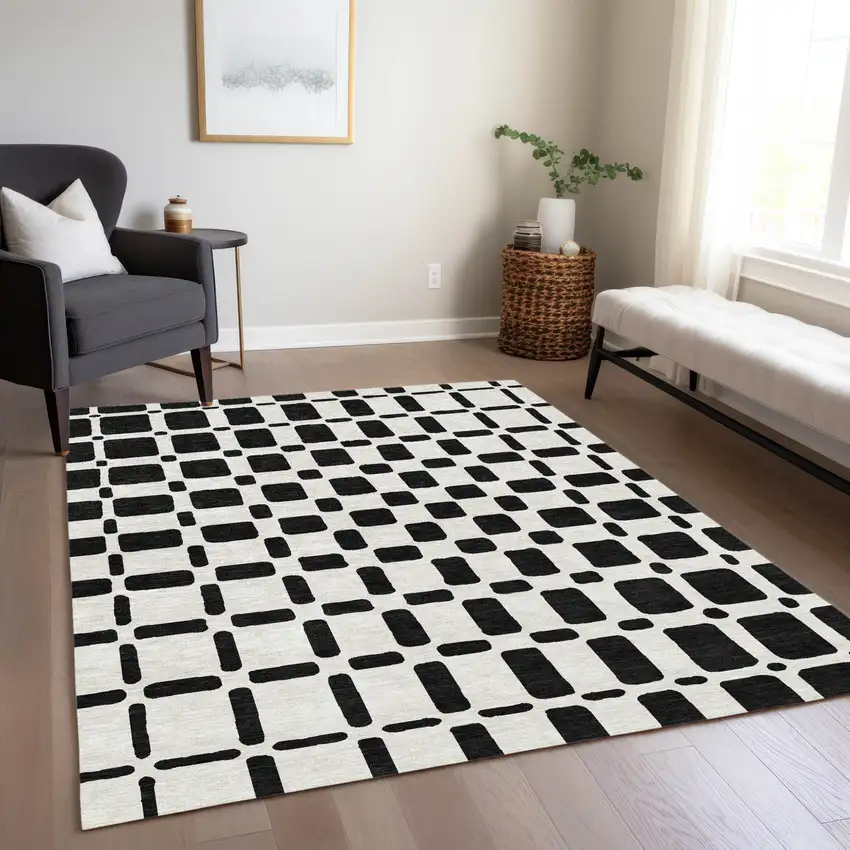 Black And Ivory Geometric Washable Indoor Outdoor Area Rug Photo 9