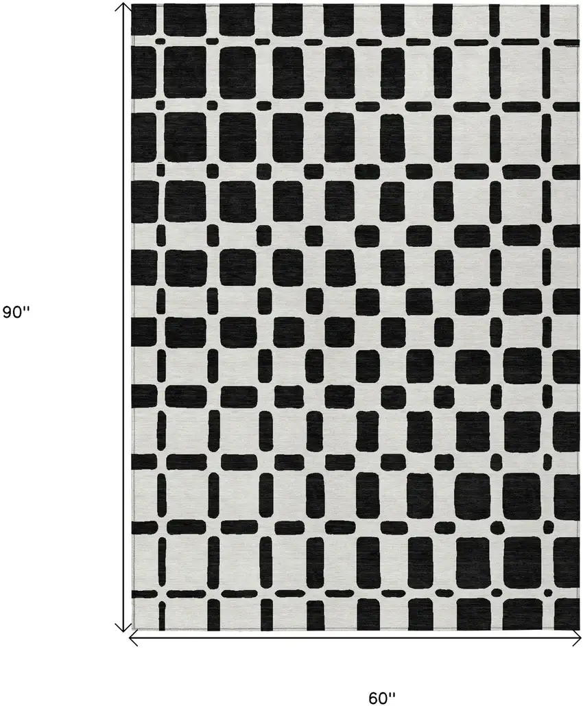 Black And Ivory Geometric Washable Indoor Outdoor Area Rug Photo 3