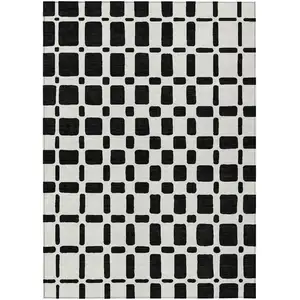 Photo of Black And Ivory Geometric Washable Indoor Outdoor Area Rug