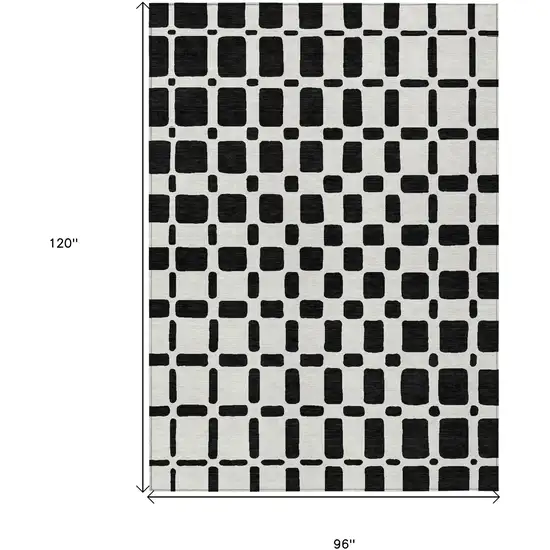 Black And Ivory Geometric Washable Indoor Outdoor Area Rug Photo 3