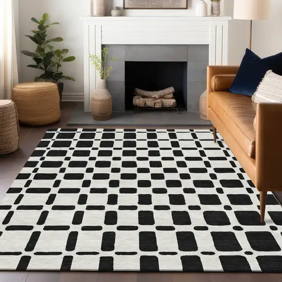 Black And Ivory Geometric Washable Indoor Outdoor Area Rug Photo 9