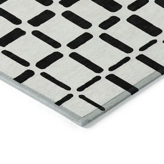 Black And Ivory Geometric Washable Indoor Outdoor Area Rug Photo 5