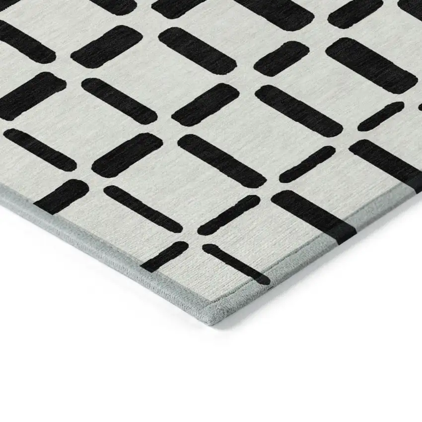 Black And Ivory Geometric Washable Indoor Outdoor Area Rug Photo 5