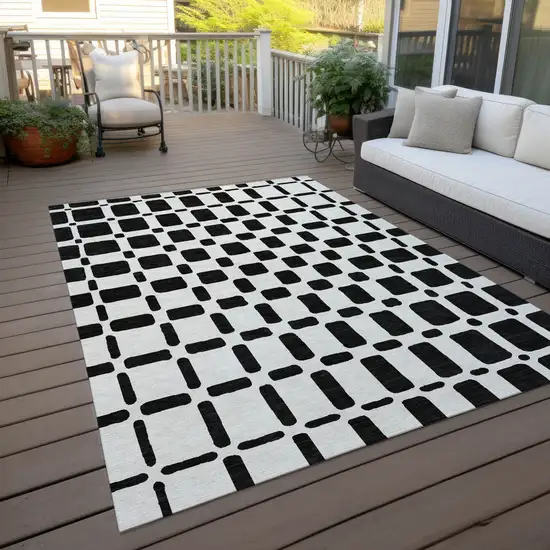 Black And Ivory Geometric Washable Indoor Outdoor Area Rug Photo 8