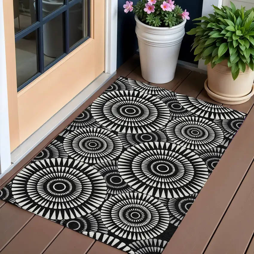 Black And Ivory Geometric Washable Indoor Outdoor Area Rug Photo 1