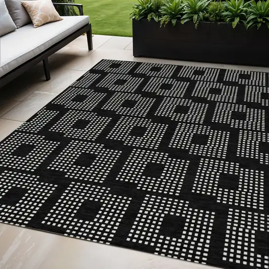Black And Ivory Geometric Washable Indoor Outdoor Area Rug Photo 1