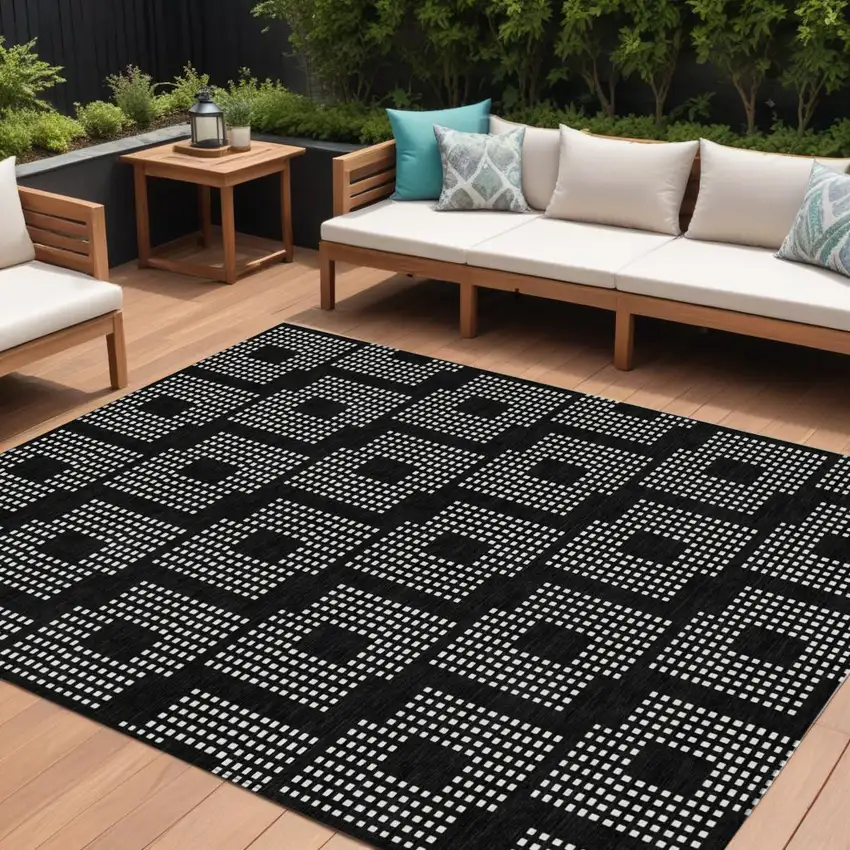 Black And Ivory Geometric Washable Indoor Outdoor Area Rug Photo 1