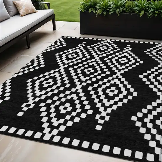 Black And Ivory Geometric Washable Indoor Outdoor Area Rug Photo 1