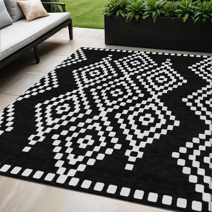 Black And Ivory Geometric Washable Indoor Outdoor Area Rug Photo 1