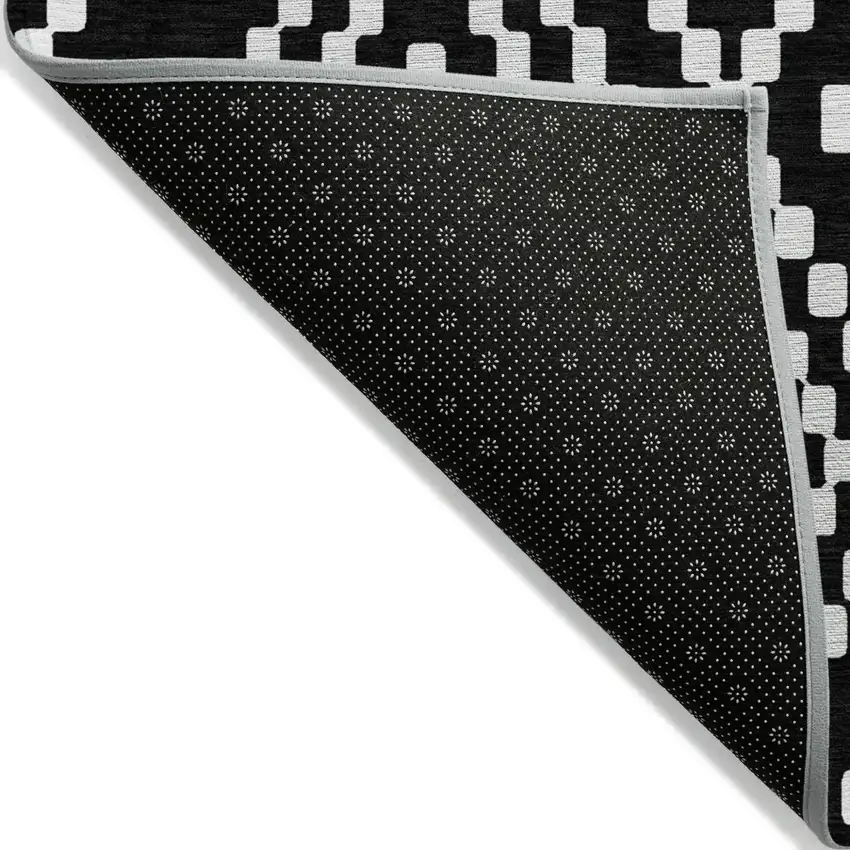 Black And Ivory Geometric Washable Indoor Outdoor Area Rug Photo 4