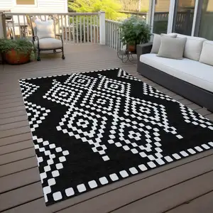 Photo of Black And Ivory Geometric Washable Indoor Outdoor Area Rug