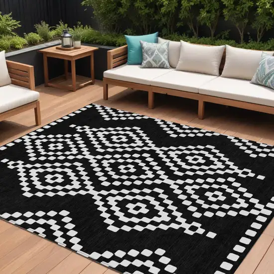 Black And Ivory Geometric Washable Indoor Outdoor Area Rug Photo 1