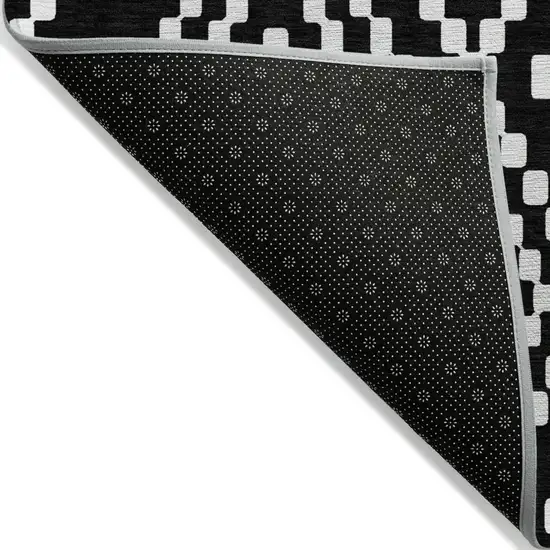 Black And Ivory Geometric Washable Indoor Outdoor Area Rug Photo 4