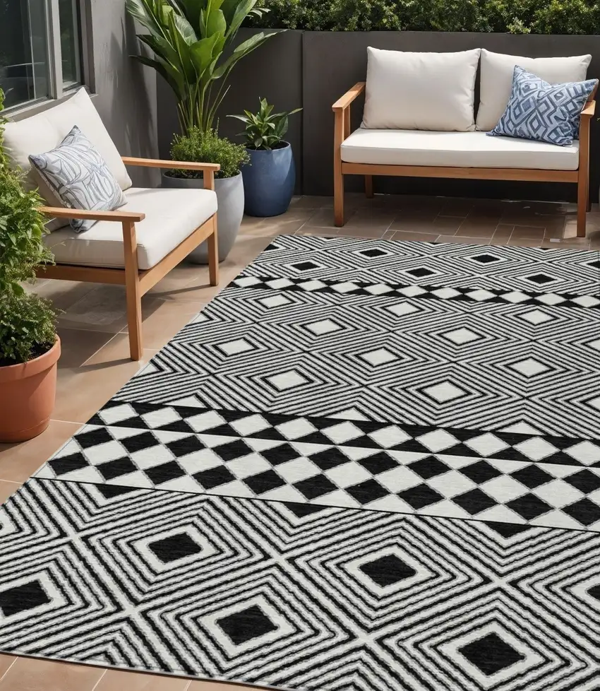 Black And Ivory Geometric Washable Indoor Outdoor Area Rug Photo 1