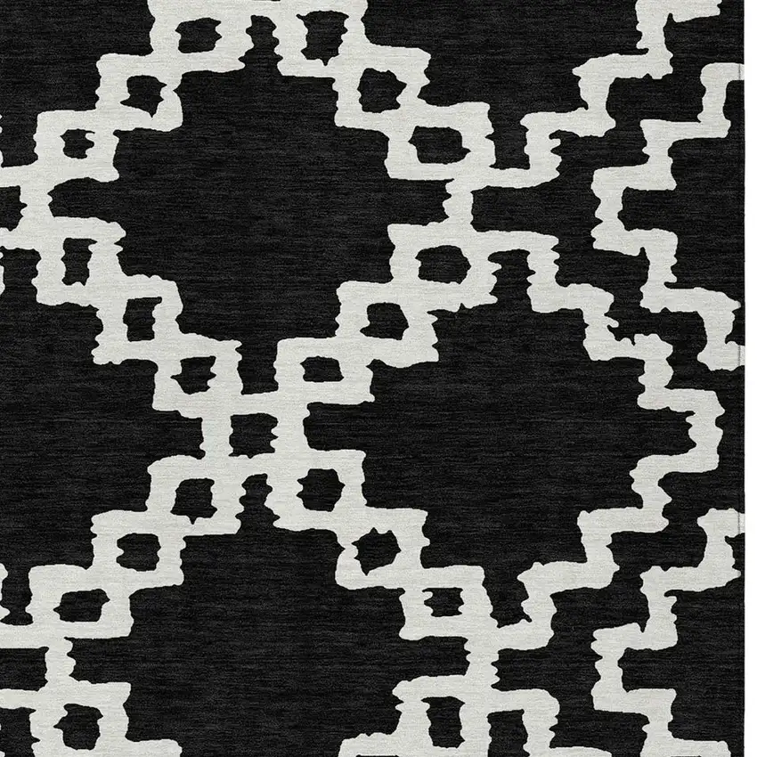 Black And Ivory Geometric Washable Indoor Outdoor Area Rug Photo 6