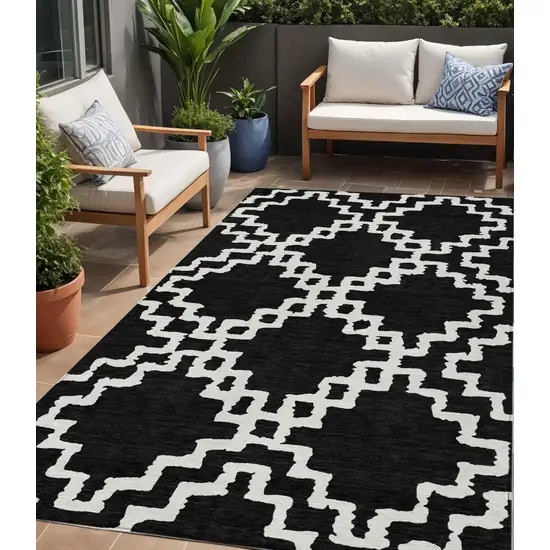 Black And Ivory Geometric Washable Indoor Outdoor Area Rug Photo 1