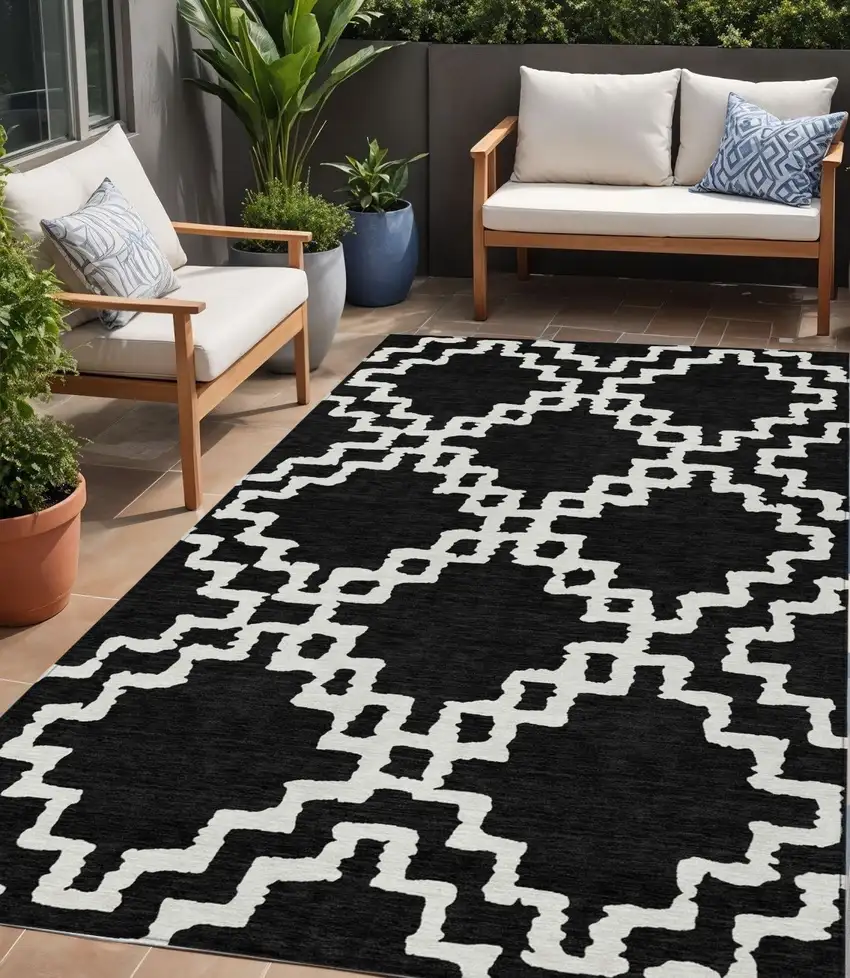 Black And Ivory Geometric Washable Indoor Outdoor Area Rug Photo 1