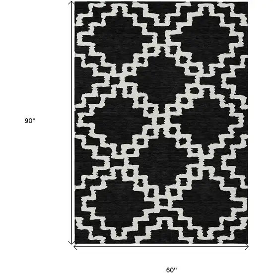 Black And Ivory Geometric Washable Indoor Outdoor Area Rug Photo 3