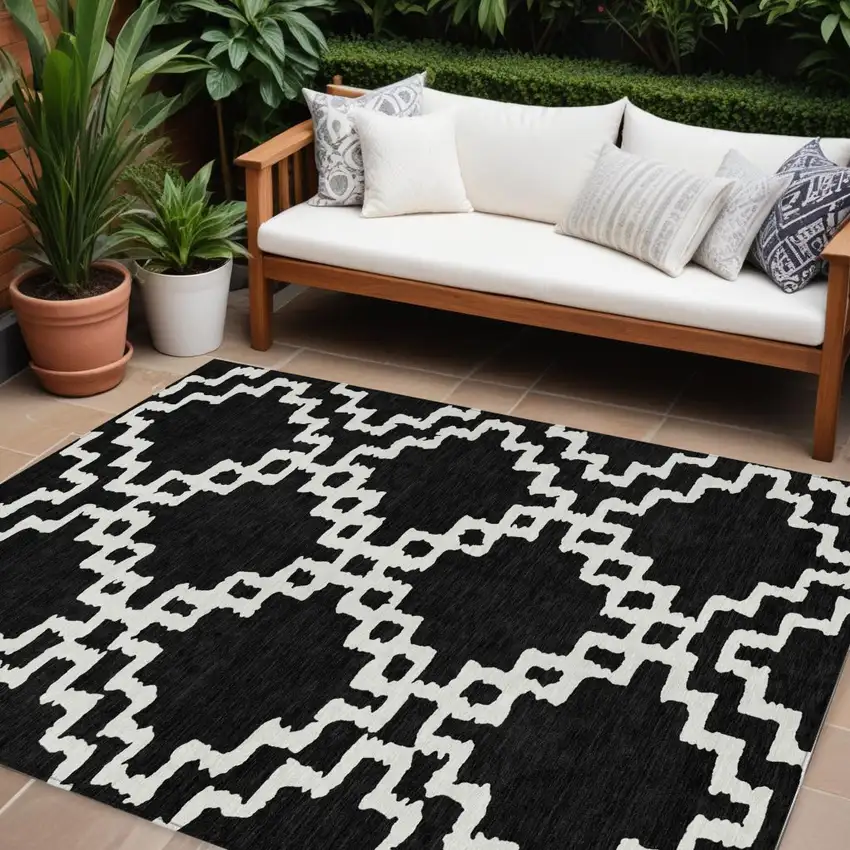 Black And Ivory Geometric Washable Indoor Outdoor Area Rug Photo 1