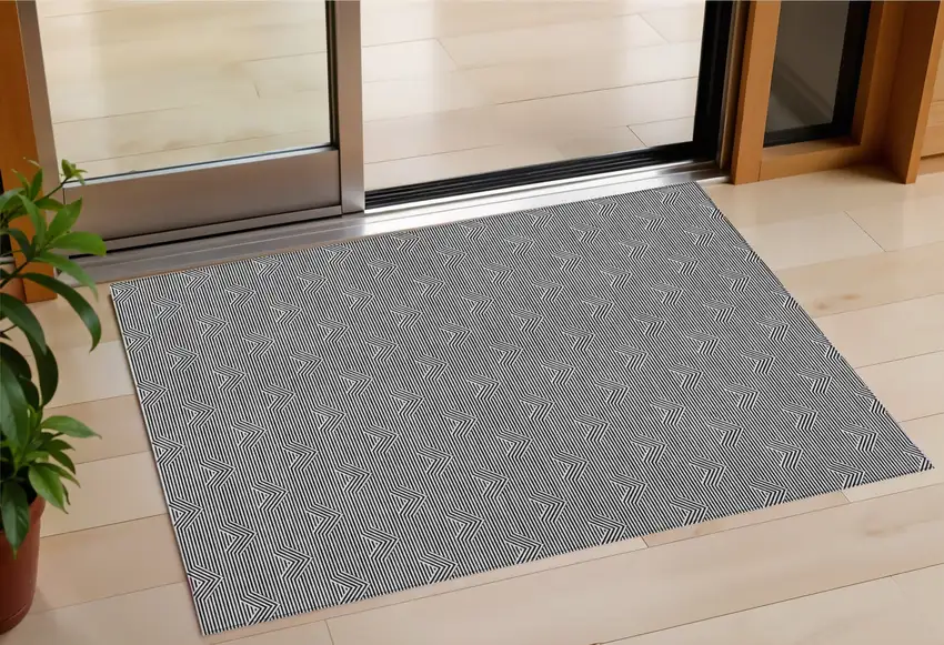 Black And Ivory Geometric Washable Indoor Outdoor Area Rug Photo 1