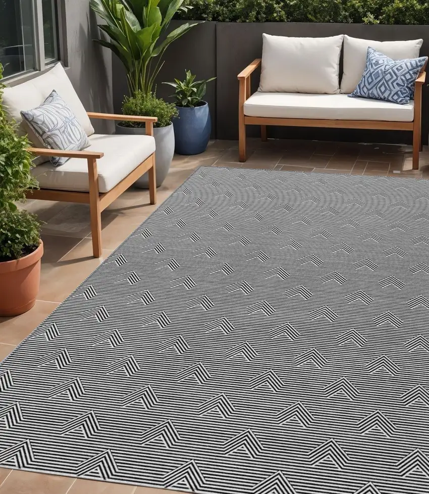 Black And Ivory Geometric Washable Indoor Outdoor Area Rug Photo 1