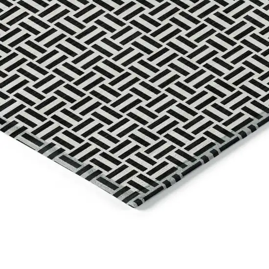 Black And Ivory Geometric Washable Indoor Outdoor Area Rug Photo 5