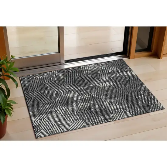 Black And Ivory Geometric Washable Indoor Outdoor Area Rug Photo 1
