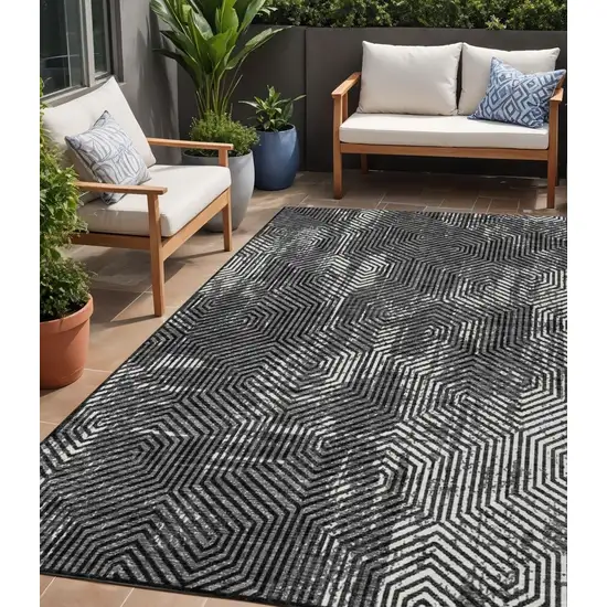 Black And Ivory Geometric Washable Indoor Outdoor Area Rug Photo 1