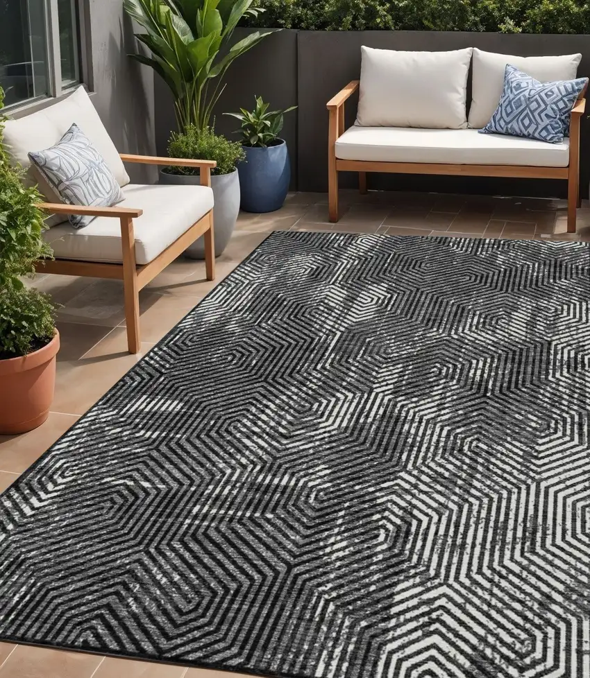 Black And Ivory Geometric Washable Indoor Outdoor Area Rug Photo 1